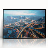 Framed acrylic wall art featuring a serene landscape with winding roads and lush greenery, showcased in a sleek black frame, perfect for modern home decor.