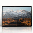 Framed acrylic wall art featuring a scenic landscape of winding roads, presented in a sleek black frame, adding a modern touch to home decor.