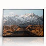 Framed acrylic wall art featuring a scenic landscape of winding roads, presented in a sleek black frame, adding a modern touch to home decor.