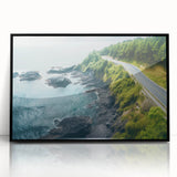 Framed acrylic wall art featuring a stunning landscape design, showcasing winding roads amidst vibrant greenery, set against a black frame for modern decor.