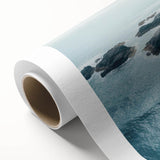 Rolled canvas artwork showcasing a vibrant landscape with winding roads and lush greenery, designed for wall decoration, presented in a protective cardboard tube.