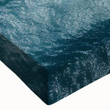 Close-up of a vibrant stretched canvas wall art piece featuring a scenic landscape with winding roads, showcasing rich colors and intricate details ideal for home decor.