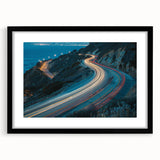 Framed wall art featuring a serene landscape design with winding roads and lush greenery, presented in a sleek black frame with a white mat. Perfect for home decor.