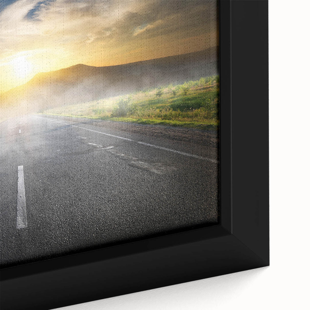 Framed canvas wall art showcasing a vibrant landscape design with winding roads and lush greenery, perfect for enhancing modern home decor. The close-up highlights intricate details and rich colors, creating a visually striking focal point for any room.
