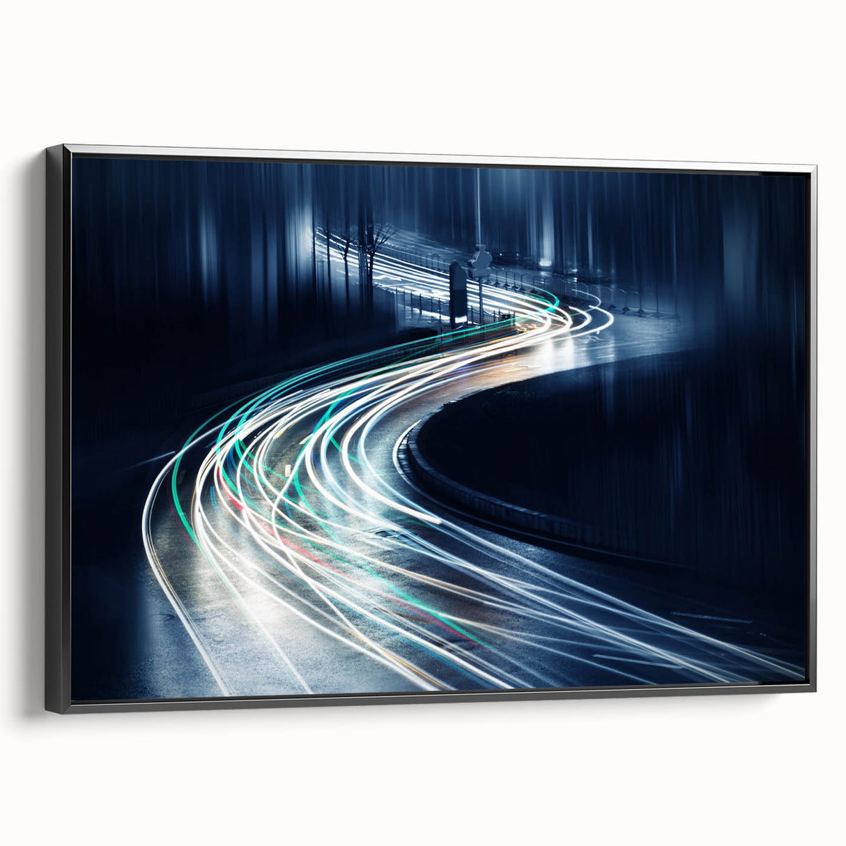 Framed canvas wall art showcasing a scenic landscape with winding roads, featuring a black frame and vibrant colors, ideal for modern home decor.