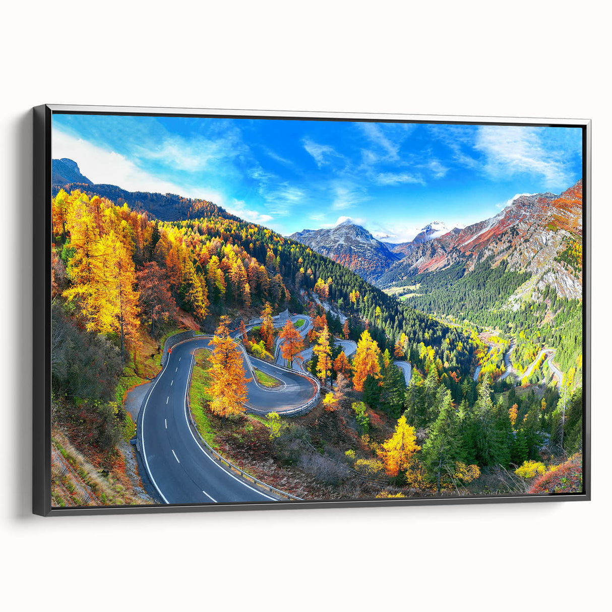 Framed canvas wall art showcasing a modern landscape design with a winding road, featuring rich colors and a sleek black frame, perfect for home decor.
