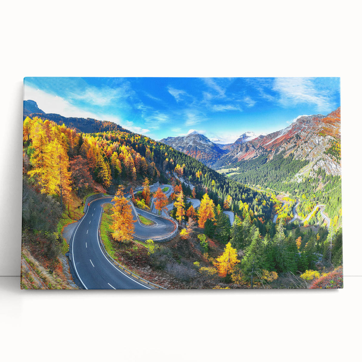 Stretched canvas wall art showcasing a serene landscape featuring winding roads and lush greenery, ideal for adding a tranquil touch to home decor.