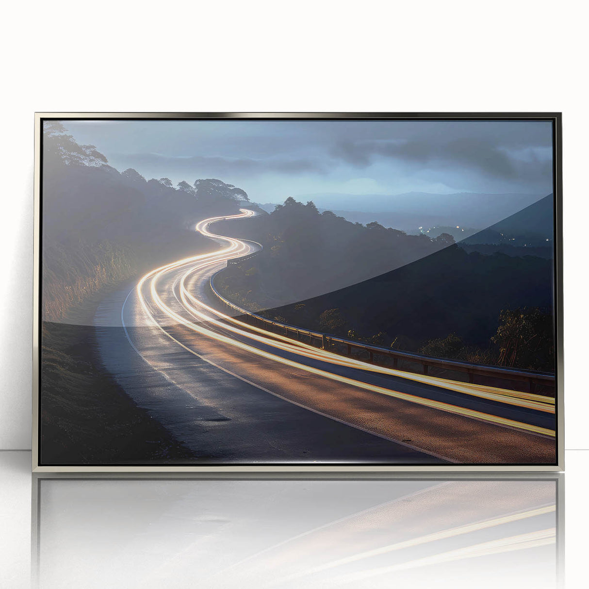 Framed acrylic wall art featuring a modern landscape design with winding roads and vibrant colors, showcased in a sleek silver frame, ideal for contemporary decor.