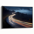 Framed canvas wall art showcasing a scenic landscape with winding roads, featuring a black frame and vibrant colors, perfect for enhancing modern decor.