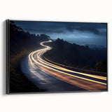 Framed canvas wall art showcasing a scenic landscape with winding roads, featuring a black frame and vibrant colors, perfect for enhancing modern decor.