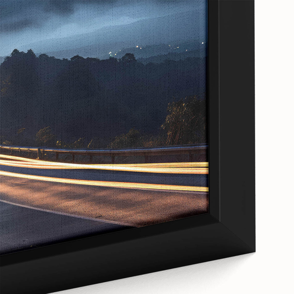 Framed canvas wall art featuring a serene landscape with winding roads, lush greenery, and a vibrant sunset, perfect for home decor and interior design inspiration.