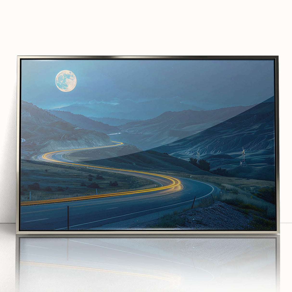 Framed acrylic wall art showcasing a serene landscape with winding roads, accented by silver details, perfect for enhancing modern home decor.