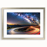 Framed wall art showcasing a serene landscape with winding roads, featuring a silver mat and frame, ideal for home decor in contemporary settings.