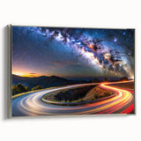 Framed canvas wall art featuring a serene landscape design with winding roads and lush greenery, elegantly showcased with a silver frame for modern decor.