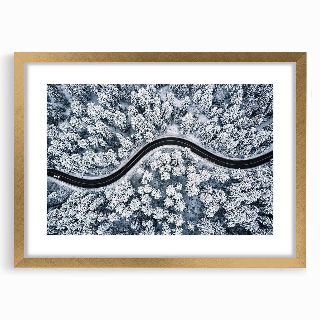 Framed wall art featuring a serene landscape design with winding roads, set in a stylish gold frame with a mat, perfect for home decor enhancement.