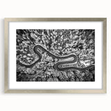 Framed landscape wall art featuring a serene road design with a silver mat, perfect for home decor. The artwork adds elegance to any room, enhancing interior aesthetics.