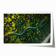 Rolled print of a stunning landscape road design showcasing vibrant hues of green and blue, perfect for home decor or art enthusiasts, packaged securely for delivery.