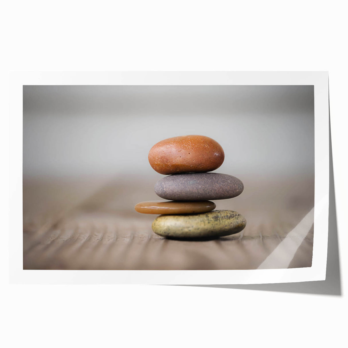 Rolled print of a serene landscape featuring vibrant rocks and earthy tones, ideal for home decor, showcasing nature's beauty in a modern design.