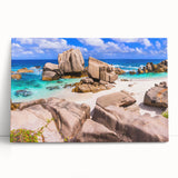 Stretched canvas wall art depicting a serene landscape with rocks and greenery, showcasing vibrant colors and a calming aesthetic, perfect for home decor.