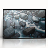 Framed acrylic wall art showcasing a stunning landscape with rocky formations, featuring a sleek black frame, perfect for modern home decor. Ideal for enhancing living spaces.