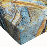Close-up of a stretched canvas wall art piece showcasing a vibrant landscape design featuring rugged rocks and natural textures, perfect for home decor. This artwork emphasizes earthy tones and intricate details, ideal for enhancing living spaces.