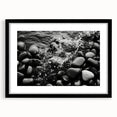 Framed landscape wall art featuring a serene rocky terrain design with a black mat, perfect for adding a modern touch to home decor.
