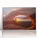 Framed acrylic wall art featuring a stunning landscape design with vibrant rocks and earthy tones, showcased in a sleek white frame, ideal for modern decor.