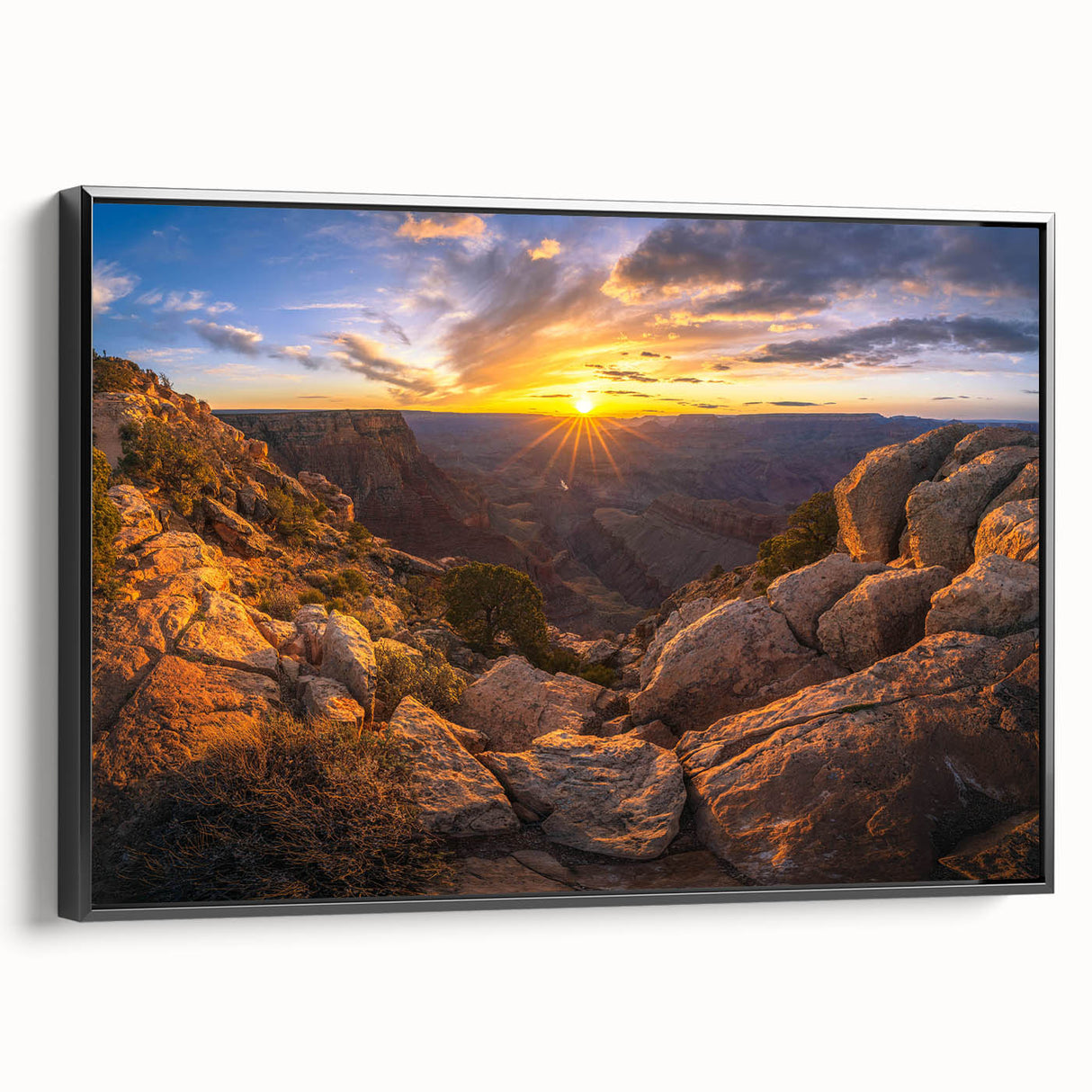 Framed canvas wall art showcasing a modern landscape design with rocks, featuring a black frame and side view, perfect for contemporary home decor.