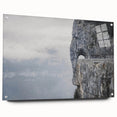 Acrylic glass wall art showcasing a modern landscape design featuring rocks and natural elements, displayed from a side view with minimalist pins for mounting.