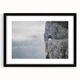 Black-framed wall art featuring a serene landscape with layered rocks and earthy tones, perfect for enhancing modern interior decor. Ideal for art enthusiasts.