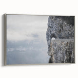 Framed canvas wall art showcasing a modern landscape design with rocks, featuring a sleek silver frame and a side view that highlights its elegant aesthetics, perfect for contemporary decor.