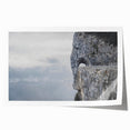 Abstract landscape wall art print showcasing vibrant colors and intricate rock formations, rolled and packaged securely in a cardboard tube for easy storage and display.