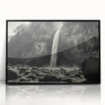 Framed acrylic wall art featuring a stunning landscape design with rocky formations, presented in a sleek black frame, perfect for modern home decor.