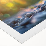 Rolled canvas artwork showcasing a vibrant landscape design featuring rugged rocks and natural elements, perfect for modern home decor, packaged securely in a durable tube.