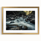 Framed wall art showcasing a stunning landscape of rocks, featuring a gold mat and elegant frame, ideal for enhancing interior decor with natural beauty.