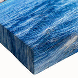 Close-up of a vibrant landscape wall art design featuring textured rocks in earthy tones, ideal for home decor enhancement and artistic expression. This stretched canvas adds depth and character to any room.