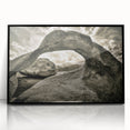 Framed acrylic wall art featuring an abstract landscape design with vibrant colors and textured rocks, set against a sleek black frame for modern decor. Perfect for enhancing interior spaces with artistic flair.