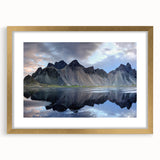 Elegant gold-framed wall art showcasing a serene landscape with rocks and natural elements, perfect for enhancing home decor and adding a touch of sophistication.