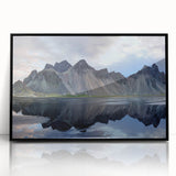 Framed acrylic wall art featuring a striking landscape design with textured rocks in earthy tones, set against a sleek black frame, perfect for modern decor.