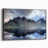 Framed canvas wall art showcasing a stunning landscape design with rocks, featuring a black frame and a side view that highlights its depth and texture, ideal for modern decor.