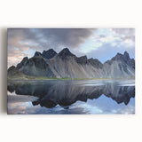 Stretched canvas artwork showcasing a vibrant landscape with rugged rocks and dramatic skies, perfect for enhancing modern home decor with natural beauty and texture.