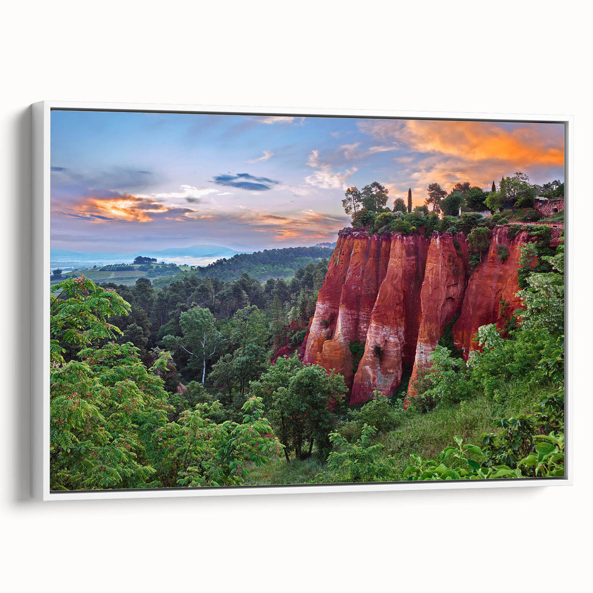 Framed canvas wall art showcasing a serene landscape with textured rocks and greenery, presented from a side view against a white background, ideal for home decor.