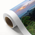 Rolled canvas artwork showcasing a stunning landscape with rocky formations and vibrant colors, perfect for enhancing home decor, packaged securely for delivery.