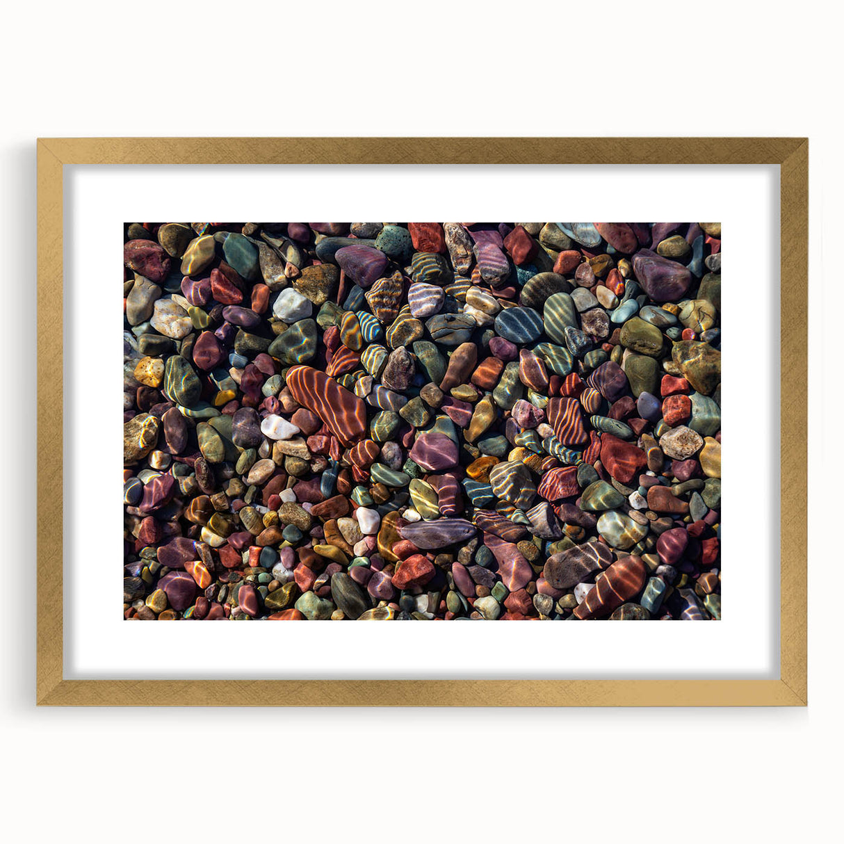 Framed landscape wall art showcasing a serene rocky scene, elegantly bordered with a gold mat, perfect for enhancing any modern interior decor.