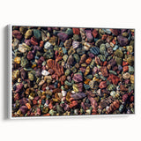 Framed canvas wall art showcasing a contemporary landscape design with textured rocks and earthy tones, elegantly displayed in a white frame, ideal for modern home decor.