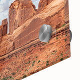 Close-up of a vibrant acrylic glass wall art piece showcasing an abstract landscape design with colorful rocks, perfect for modern home decor.