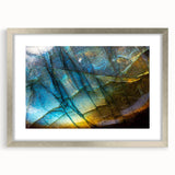 Framed landscape wall art featuring a striking rock design in natural tones, accented by a silver mat and frame, perfect for modern home decor.