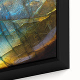 Close-up view of a framed canvas showcasing a vibrant landscape design with intricate rock formations, ideal for modern home decor. The artwork features rich colors and textures, enhancing any living space with its natural beauty.