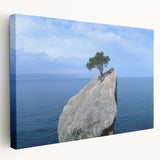 Stretched canvas wall art showcasing a vibrant landscape design with rocky formations, featuring rich colors of blue and earthy tones, perfect for modern decor.