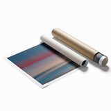 Rolled print showcasing a serene seascape design, featuring calming blues and greens, ideal for enhancing home decor. Packaged securely for safe delivery.